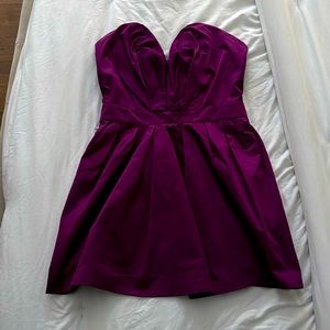 This dress is a size small in a burgundy red wine color from the designer YSL.
